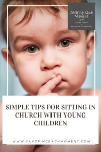 young child with finger on his lips to say "Shhh" as children in church learn to participate quietly