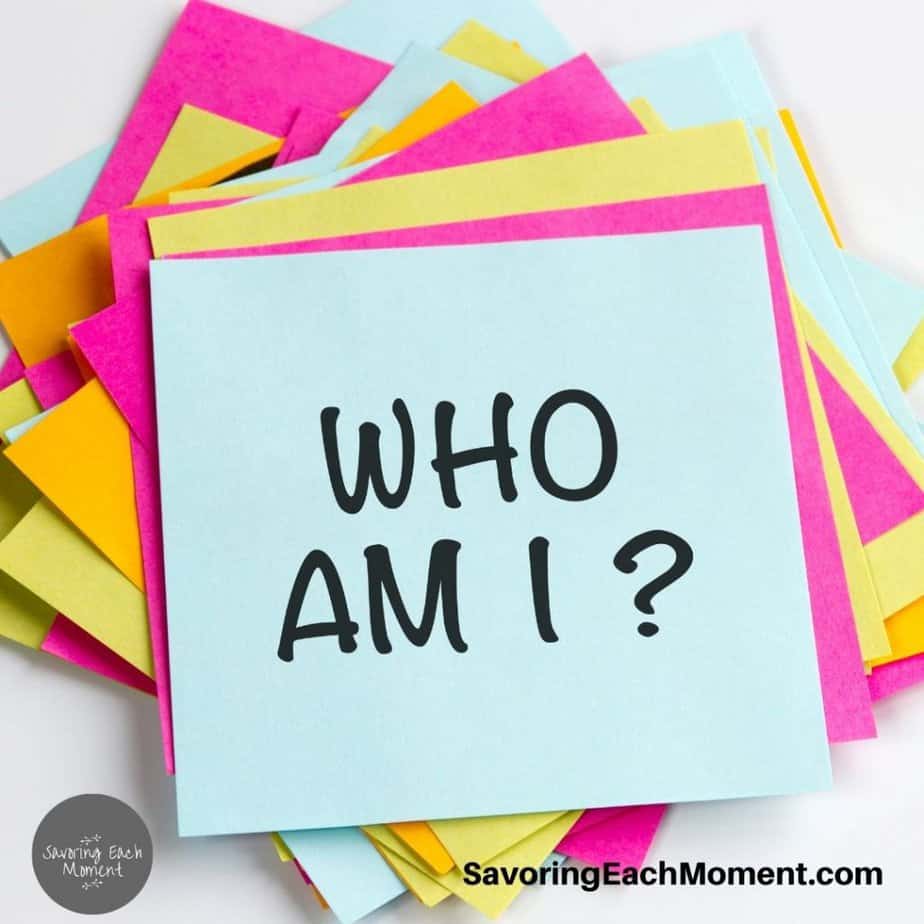 stack of sticky notes with "who am I?" written on them