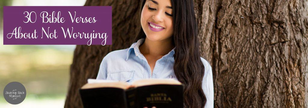 smiling woman reading Bible verses about not worrying