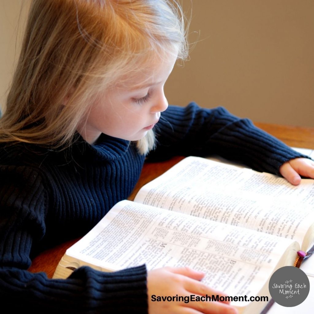 girl with Bible - Bible verses for kids to memorize
