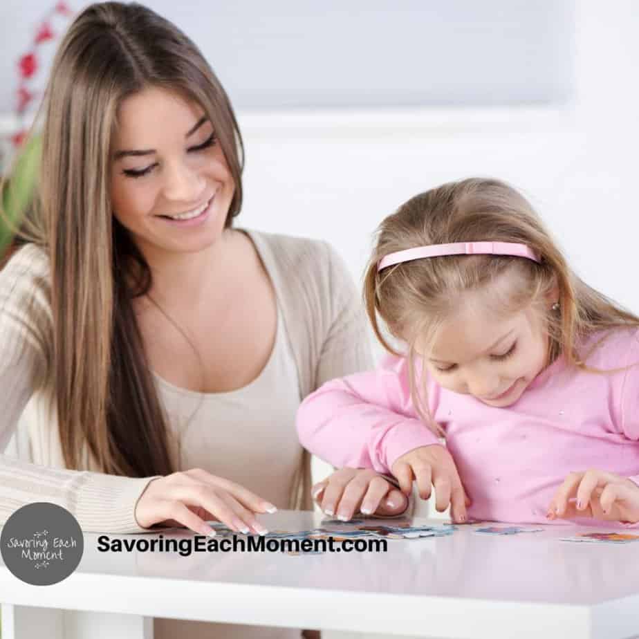 girl working on a Bible puzzle