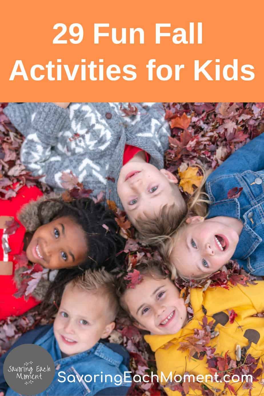 Kids in the leaves enjoying fall activities for kids