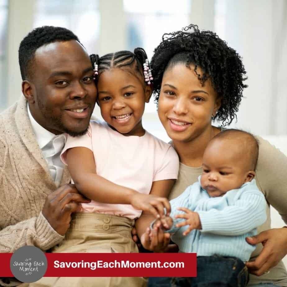 family sitting on couch together