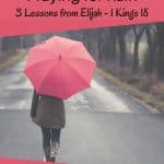woman with pink umbrella - waiting on God while praying for rain